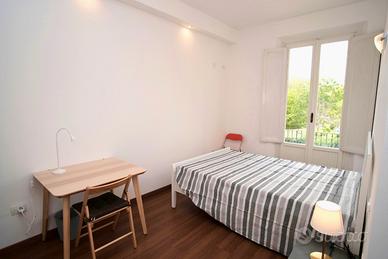 Ampia camera con bagno e balcone privati