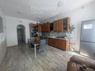 Appartamento con corte privata e cantina