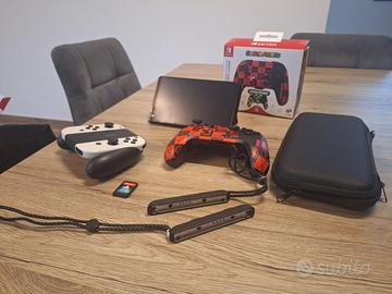 Nintendo Switch OLED (Bianca) + Accessori e Giochi
