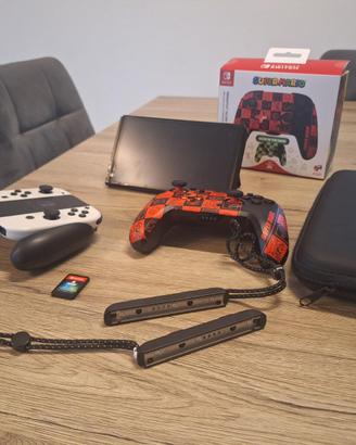 Nintendo Switch OLED (Bianca) + Accessori e Giochi