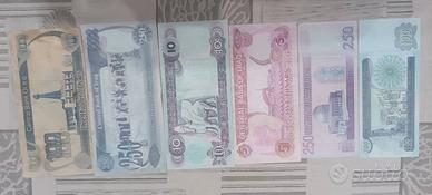 banconote Iraq con fotografia Saddam Hussein