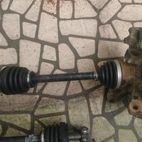 semiassi dx e sx completi di fuselli Fiat Strada 