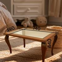 Tavolo in legno naturale con il vetro 