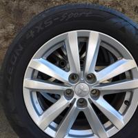 4 cerchi in lega Mitsubishi + 4 gomme 4 stagioni