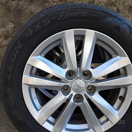 4 cerchi in lega Mitsubishi + 4 gomme 4 stagioni