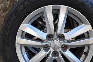 4 cerchi in lega Mitsubishi + 4 gomme 4 stagioni