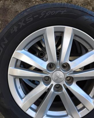 4 cerchi in lega Mitsubishi + 4 gomme 4 stagioni