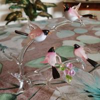 Rondini sul ramo in cristallo