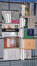 Libri universitari economia/diritto, singoli/blocc