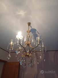 lampadario ottone con dettagli