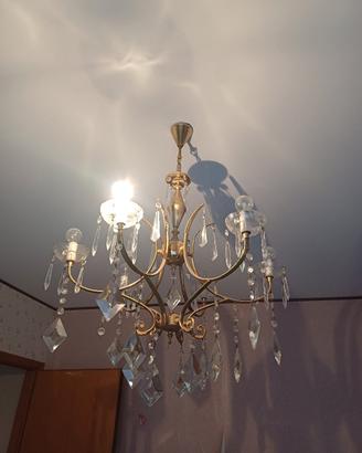 lampadario ottone con dettagli
