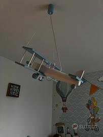 Lampadario in lengno  a forma di aeroplano