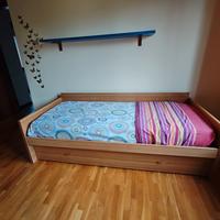 letto singolo con  materasso cassettone e libreria