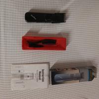 Rasoio regolabarba e capelli con pile da viaggio.