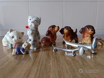 SOPRAMMOBILI A FORMA DI CANI E GATTI