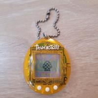 Funzionante Tamagotchi raro giallo trasparente