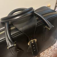 Valigia vintage in vera pelle nera, anni '50