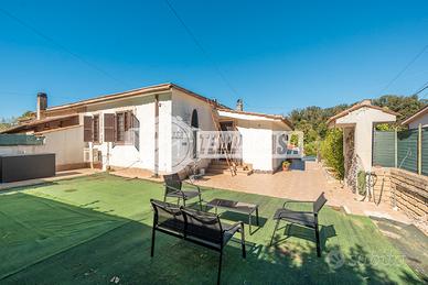 APPARTAMENTO IN VILLA RISTRUTTURATO CON GIARDINO -