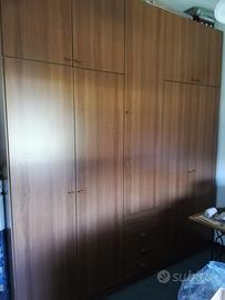 Armadio 9 ante con cassetti