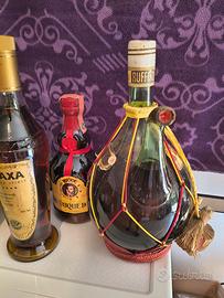 cognac liquore  bottiglie  rosso antico Dalì
