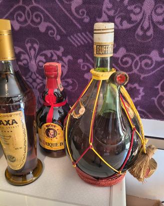 cognac liquore  bottiglie  rosso antico Dalì