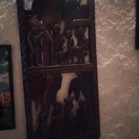 Quadro in legno intagliato.