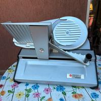 Affettatrice ed  estrattore frutta e verdura