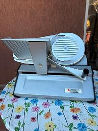 Affettatrice ed  estrattore frutta e verdura