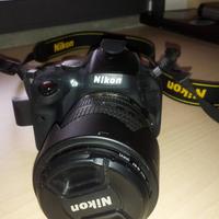 Fotocamera Reflex Nikon D5100 corpo + cover + zain