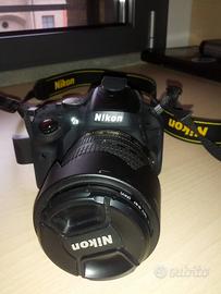 Fotocamera Reflex Nikon D5100 corpo + cover + zain