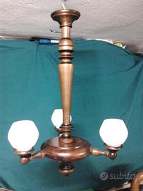 Due lampadari in legno massello