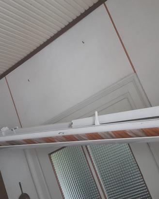 tenda da sole a bracci manuale