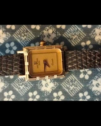 Orologio Microma cinturino in pelle cassa dorata.