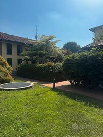 Villetta a schiera in contesto residenziale