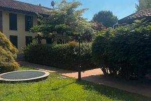 Villetta a schiera in contesto residenziale