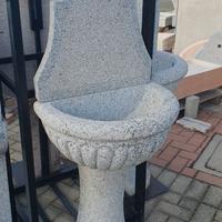 Fontana a parete a muro in pietra granito