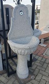 Fontana a parete a muro in pietra granito