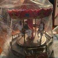 Giostra natalizia con luci, canzoni e movimento