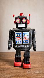 Robot vintage in latta con scatola originale