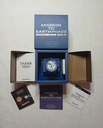 OmegaxSwatch Mission to EarthPhase Moonshine Gold