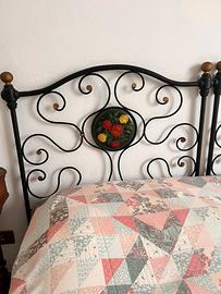 Testiera letto in ferro battuto decorato