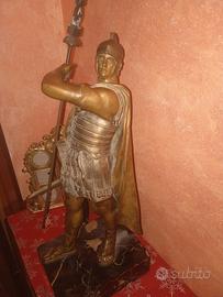 statua 