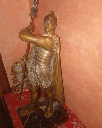 statua 