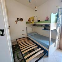 letto a castello + lettino a scomparsa sotto