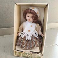 Bambola in porcellana