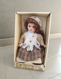 Bambola in porcellana