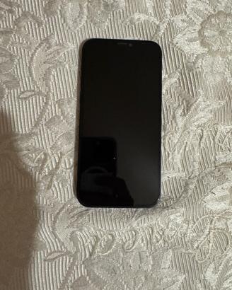 iPhone 12 blu scuro con accessori MagSafe