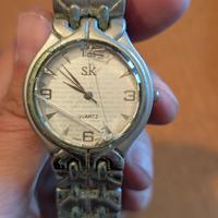Quartz SK orologio vintage (davvero mal ridotto)