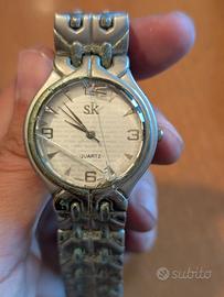 Quartz SK orologio vintage (davvero mal ridotto)