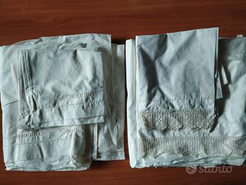 Lenzuola matrimoniali riamate a mano. Ricami vari